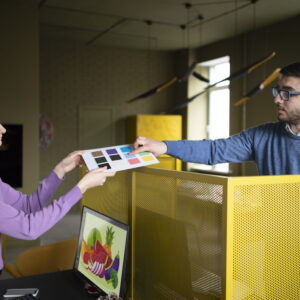 medium-shot-people-work-holding-color-palette